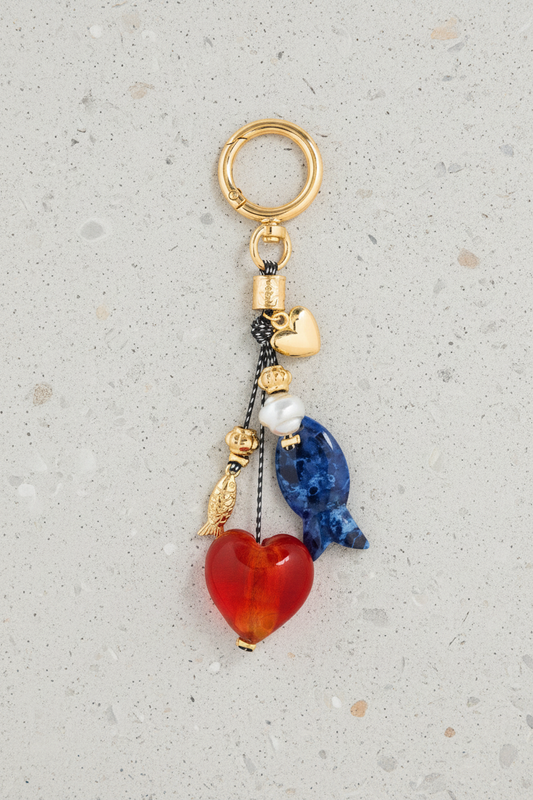 Bag Charm — fondo ivory estándar